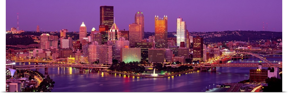 Large print of a horizontal photograph of skyline in Pittsburgh, Pennsylvania at night.