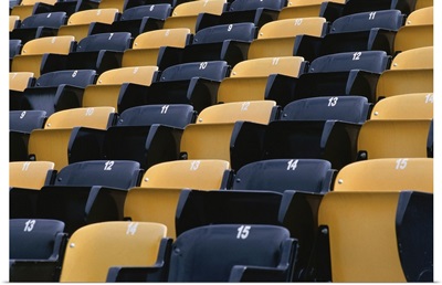 Empty row of seats in sports stadium