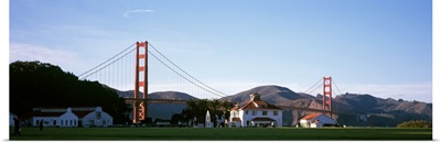 Field with suspension bridge and mountains, Crissy Field, Golden Gate Bridge, San Francisco, California,