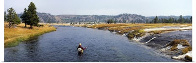 Fisherman fishing in a river, Firehole River, Yellowstone National Park, Wyoming