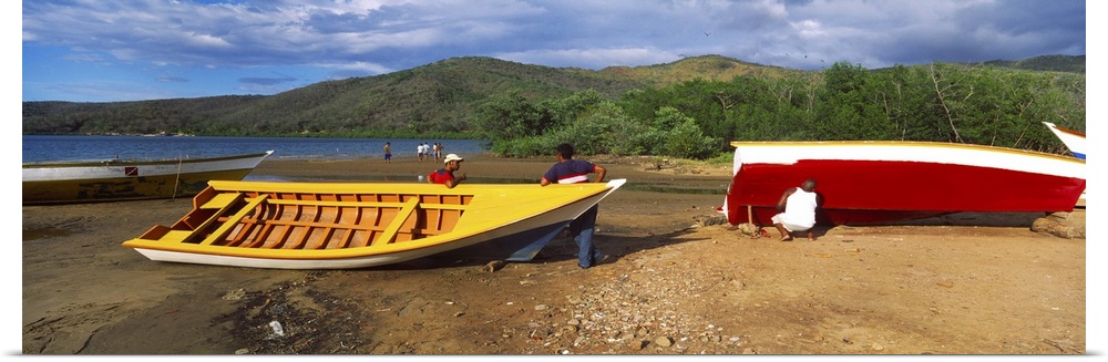 Fishermen repairing boats Mochima Mochima National Park Anzoategui State Sucre State Venezuela
