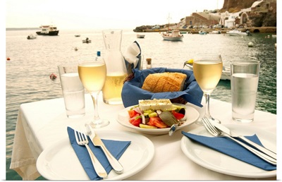 Food on a table at the seaside, Ammoudia, Santorini, Cyclades Islands, Greece
