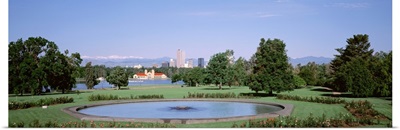 Formal garden in City Park with city and Mount Evans in background, Denver, Colorado