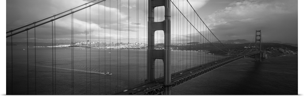 Panoramic photo on canvas of the Golden Gate Bridge with the San Francisco cityscape in the distance.