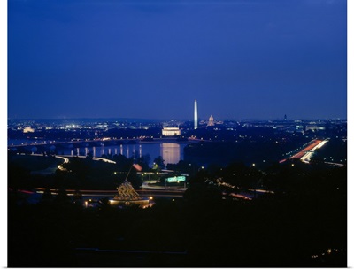 High angle view of a cityscape with monuments in the background, Washington Monument, Lincoln Memorial, Capitol Building, Washington DC