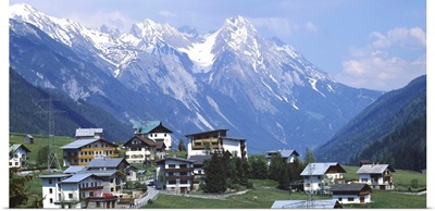 High angle view of a village on a landscape and a mountain range in the background, St. Anton, Austria