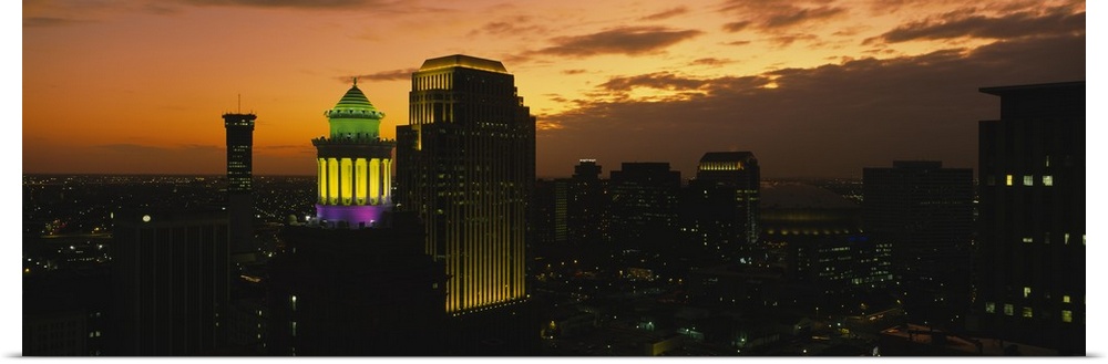 High angle view of buildings lit up at dusk, New Orleans, Louisiana
