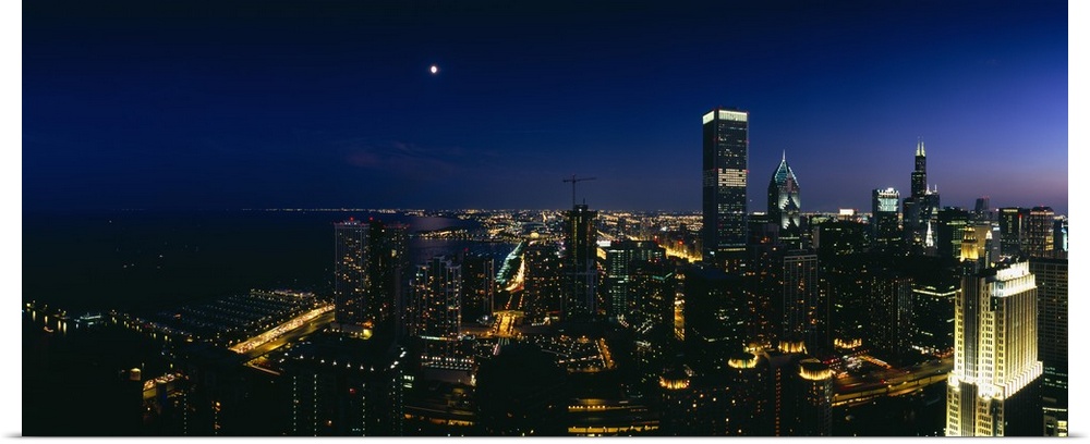 High angle view of skyscrapers lit up at night, Chicago, Illinois