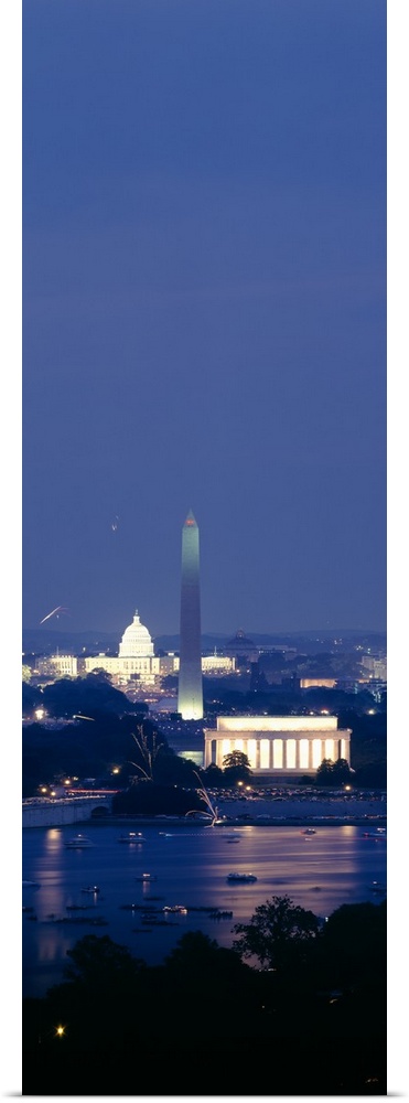 High angle view of the Lincoln Memorial, Washington Monument, and US Capitol Building at night, Washington DC