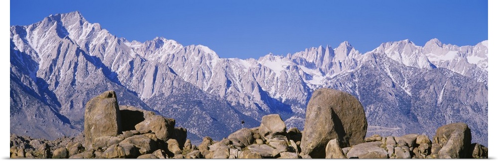 Hiker standing on a rock, Lone Pine, Californian Sierra Nevada, California