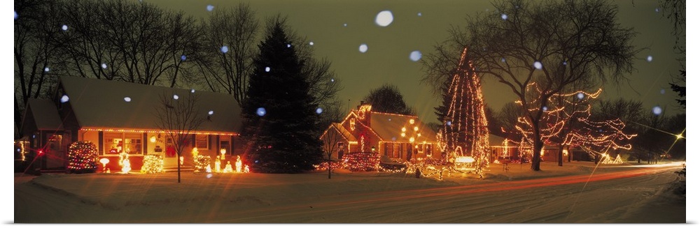 A snowy holiday scene of festive lights in Minneapolis, Minnesota.