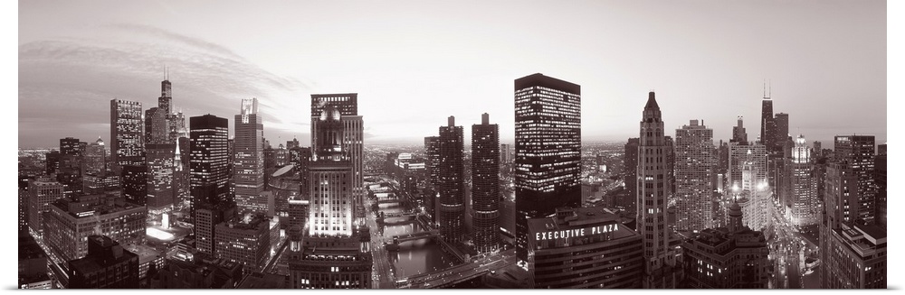 This wide angle panoramic photograph shows this Midwestern city skyline in a monochromatic tint.