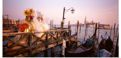Italy, Venice, St Mark's Basin, people dressed for masquerade