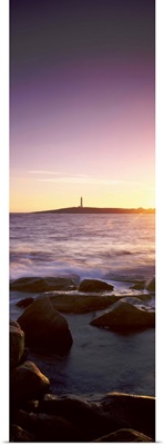 Lighthouse on an island at sunset, Cape Leeuwin, Western Australia, Australia
