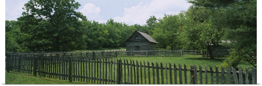 Log cabin surrounded by picket fence, Puckett Cabin, Blue Ridge Parkway, Virginia