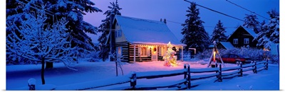 Log House with Christmas Lights Laurentians Canada