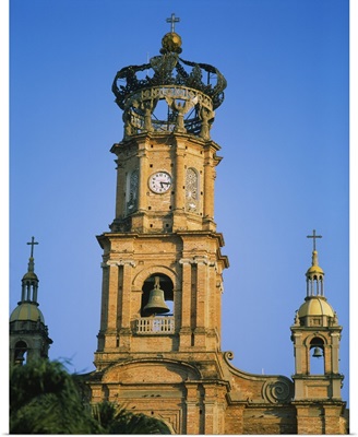 Low angle view of a bell tower of a cathedral, Cathedral of Our Lady of Guadalupe, Puerto Vallarta, Mexico