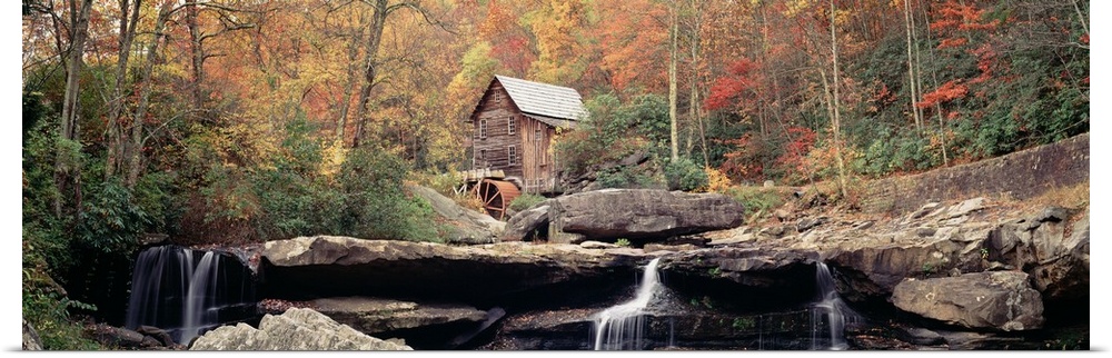 A water mill above a waterfall in Babcock State Park, West Virginia in the fall.