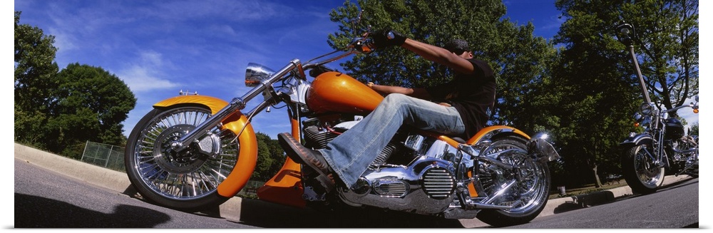 Low angle view of a man riding a motorcycle, Wisconsin