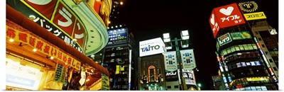 Low angle view of buildings lit up at night Shinjuku Ward Tokyo Prefecture Kanto Region Japan