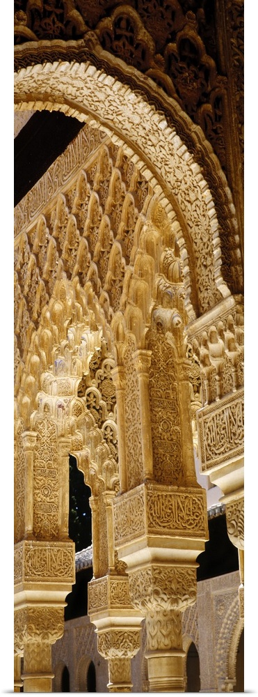 Low angle view of carving on arches and columns of a palace, Court Of Lions, Alhambra, Granada, Andalusia, Spain