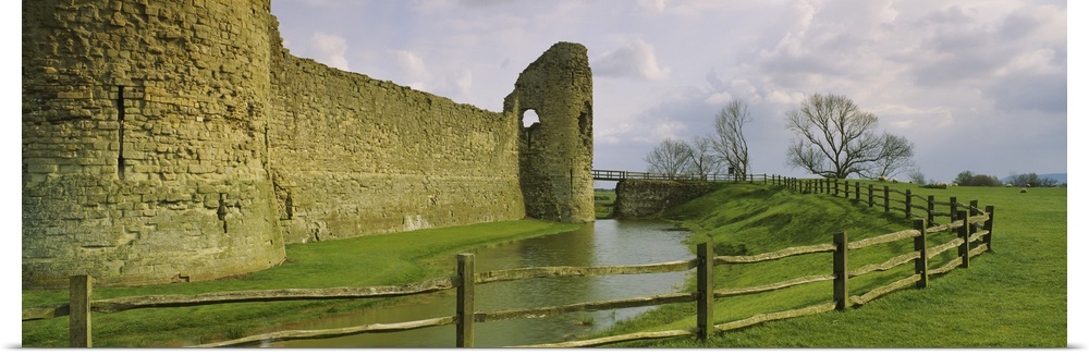 Moat surrounding a castle, Pevensey Castle, Pevensey, Sussex, England