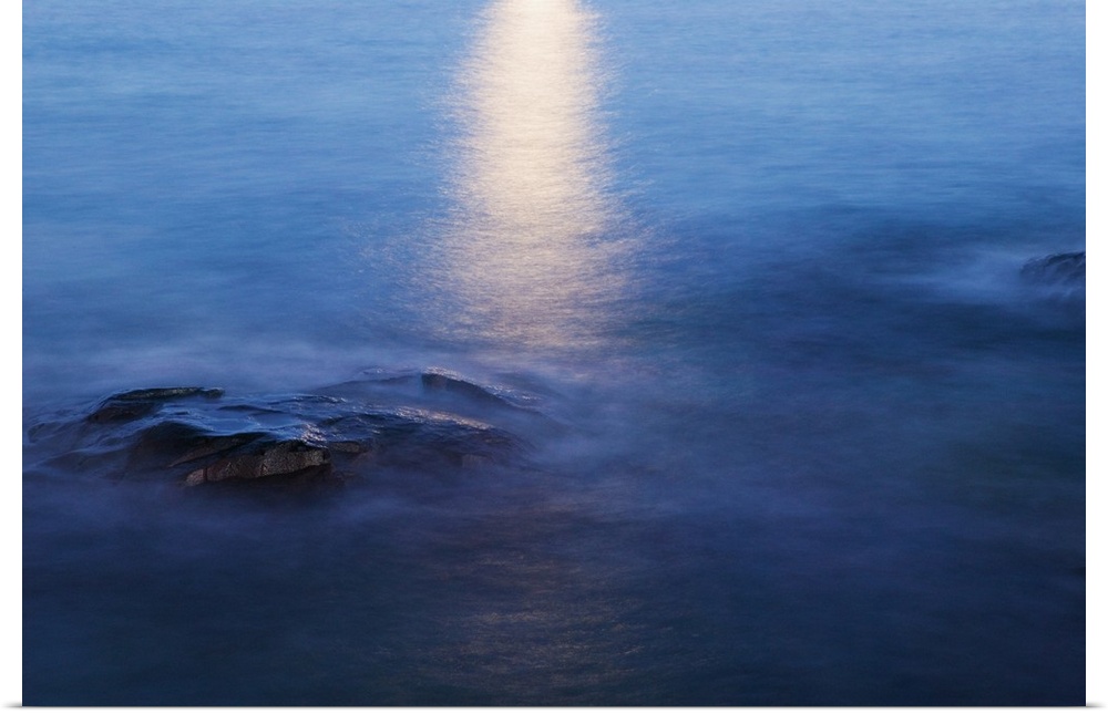 Moon reflection in calm water of Lake Superior, from Artist Point, Minnesota