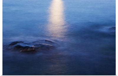 Moon reflection in calm water of Lake Superior, from Artist Point, Minnesota