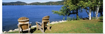 New York, Adirondack State Park, Adirondack Mountains, Fourth Lake, Adirondack Chairs on a lawn