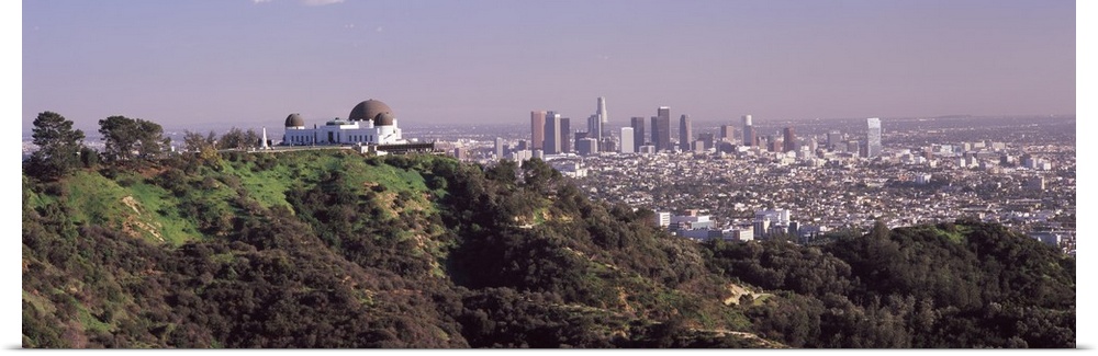 Observatory on a hill with cityscape in the background Griffith Park Observatory Los Angeles California