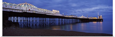 Pier lit up at dusk Brighton Pier Brighton East Sussex England