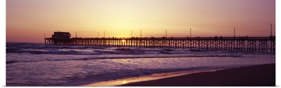 Pier over the ocean at dusk Newport Pier Newport Beach Orange County California