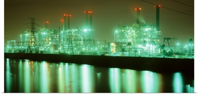 Power station illuminated at night, Haynes Generating Station, San Gabriel River, Los Angeles, California
