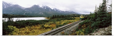 Railroad track passing through a landscape, Yukon Railroad, Summit Lake, White Pass, Alaska