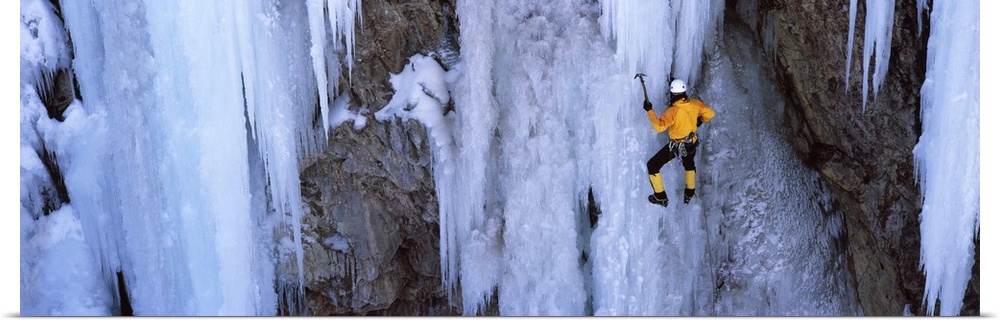Rear view of a person ice climbing, Colorado