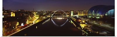 Reflection of a bridge on water, Millennium Bridge, Newcastle, Northumberland, England