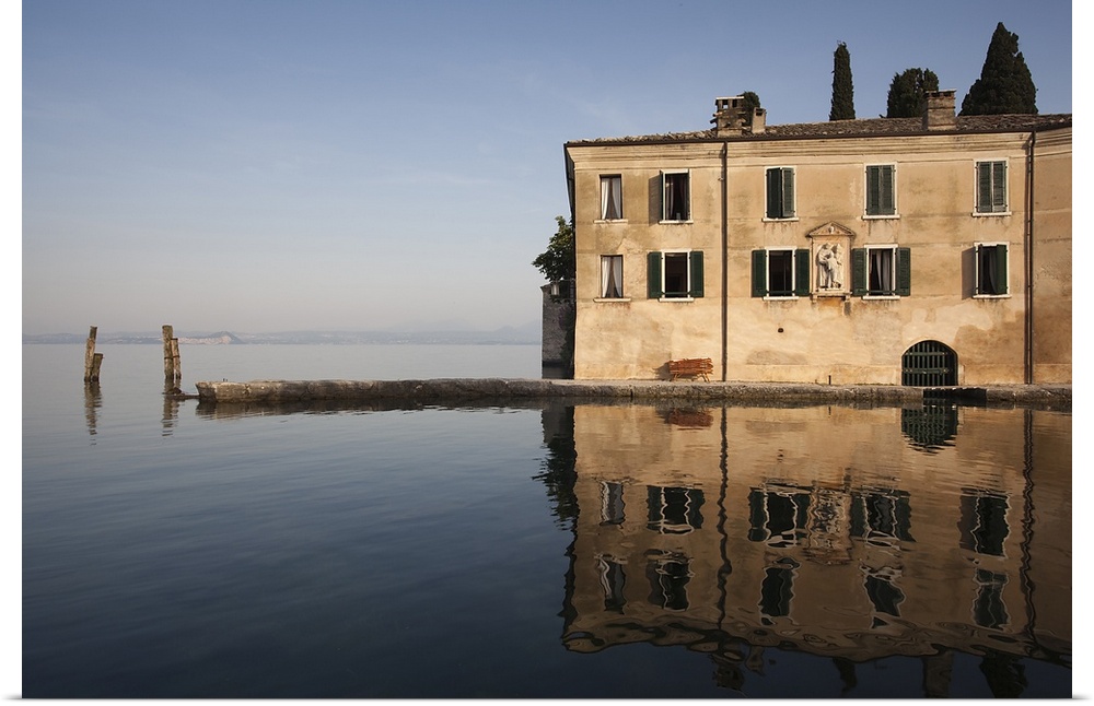 Reflection of building in a lake, Punta San Vigilio, Lake Garda, Garda