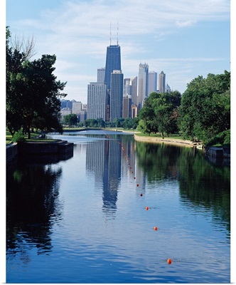 Reflection of buildings in a lagoon, Lincoln Park Lagoon, Lincoln Park, Chicago, Cook County, Illinois,