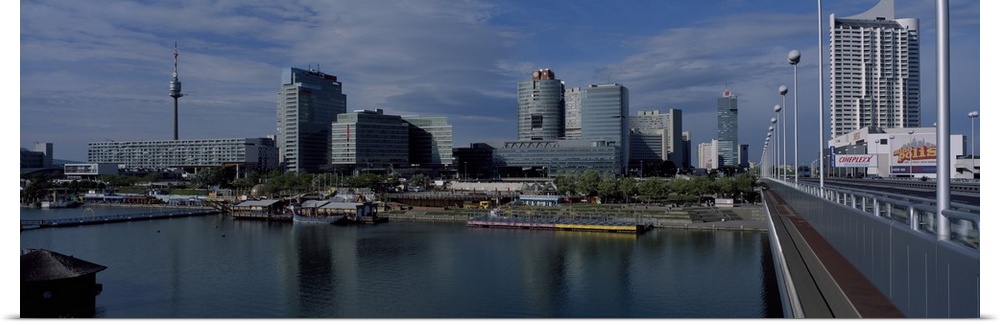 Reflection of buildings in a river, Danube River, Vienna International Center, Vienna, Austria