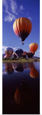 Reflection of hot air balloons in a lake Hot Air Balloon Rodeo Steamboat Springs Routt County Colorado