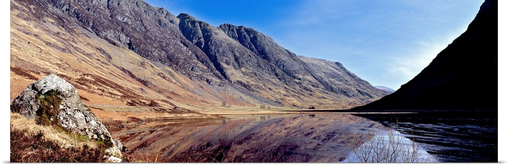 Reflection of mountains in a lake Loch Achtriochtan Glen Coe Highlands Region Scotland