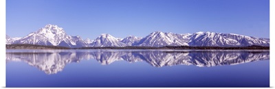 Reflection of mountains in a lake, Teton Range, Jackson Lake, Grand Teton National Park, Wyoming,