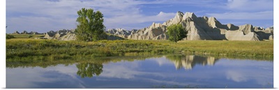 Reflection of mountains in water, Palmer Creek Unit, Badlands National Park, South Dakota