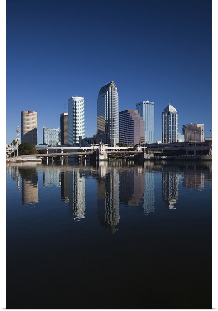 Tall image on canvas of buildings in Tampa reflected in the waterfront.