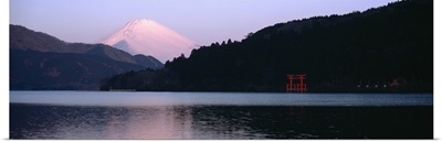 Reflection of snowcapped mountains in a lake, Lake Ashinoko, Mt Fuji, Hakone, Kanagawa Prefecture, Japan