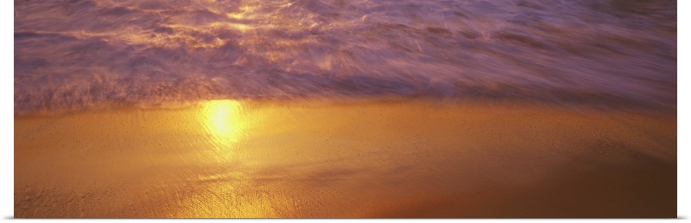 Reflection of sun in water on the beach, La Jolla, California