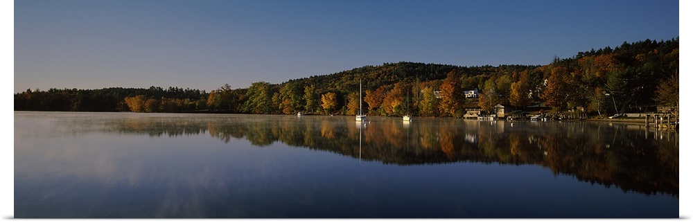 Reflection of trees in a lake, Lake Winnipesaukee, Center Harbor, Belknap County, New Hampshire, USA