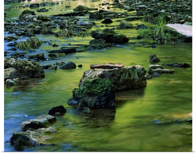 Reflective water in rocky stream, White Pine Hollow Preserve, Iowa