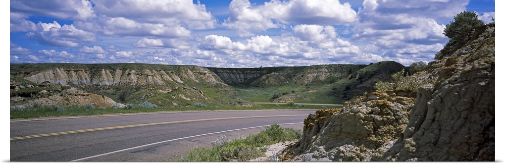 Road passing through a landscape, Badlands, Theodore Roosevelt National Park, North Dakota