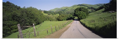 Road passing through a landscape, California